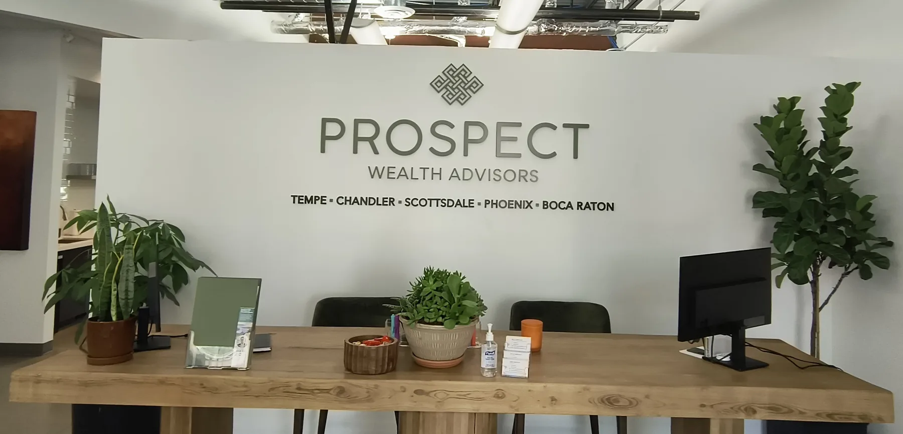 Prospect Wealth Advisors interior lobby sign