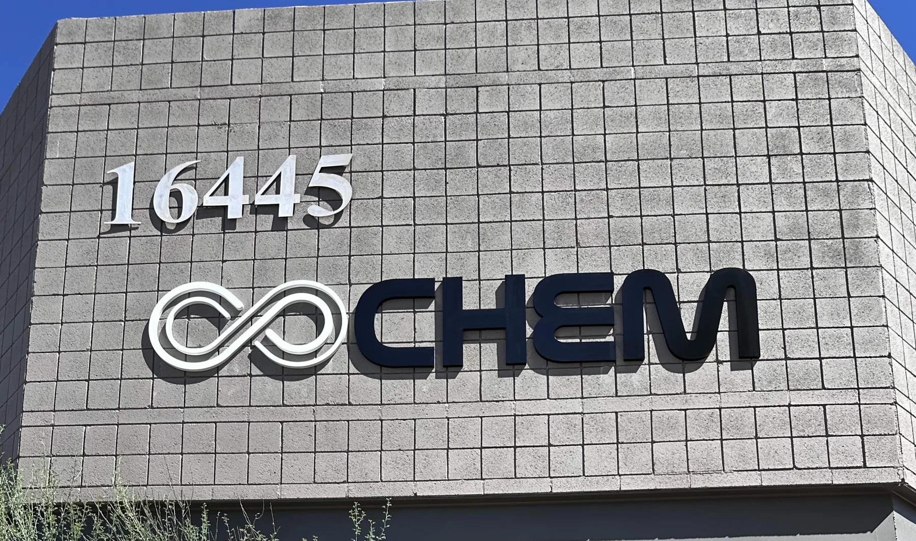 Completed manufacturing company building sign